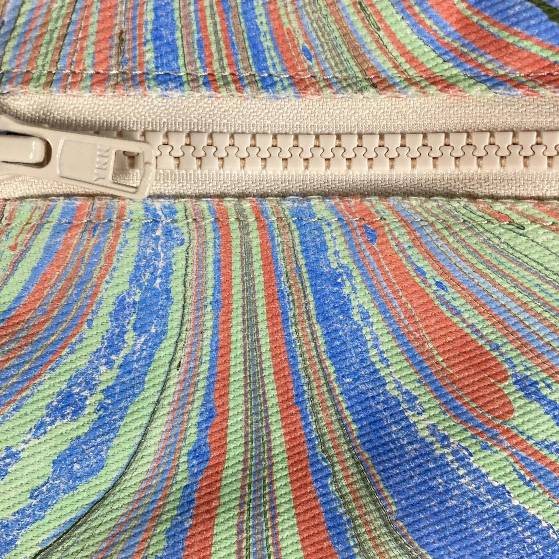 Close up of a water marbled fanny pack