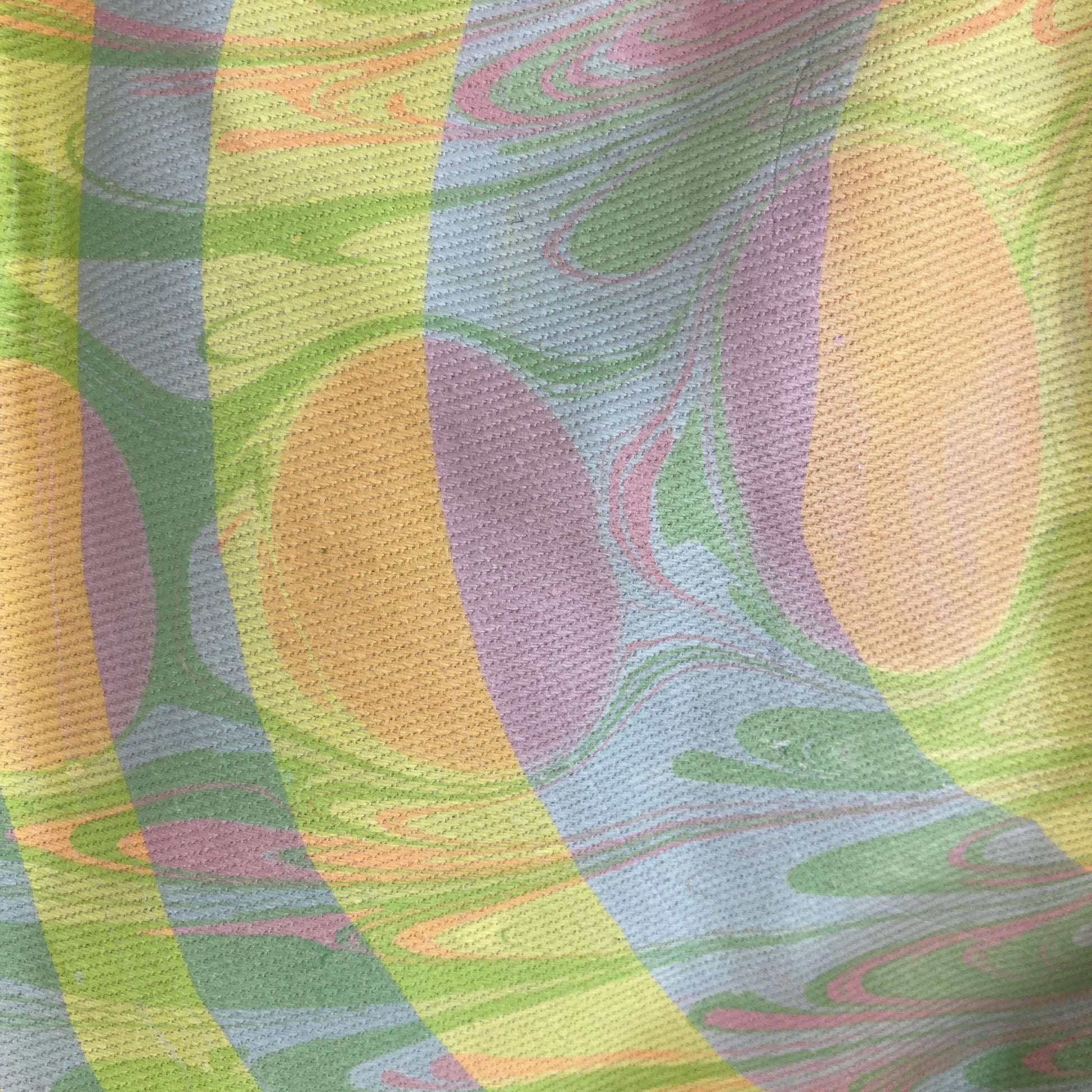 Close up of double printed water marbled fabric